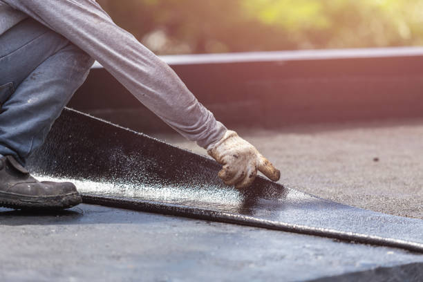 Professional Waterproofing technician working in Mulliken, MI